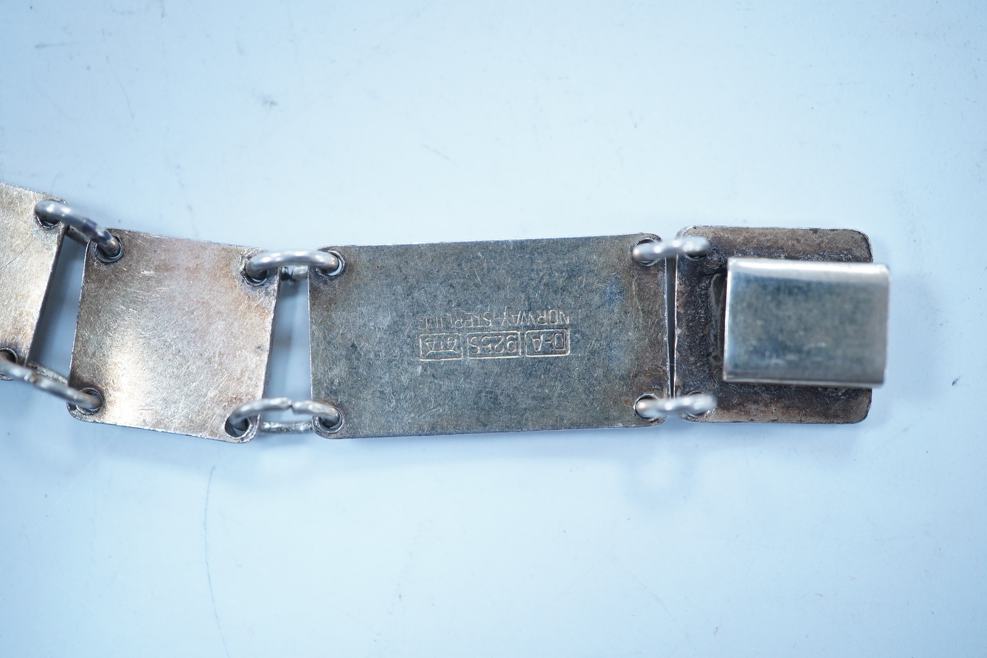 A Norwegian sterling and enamel bracelet, by David Andersen, 18.6cm. Condition - fair to good